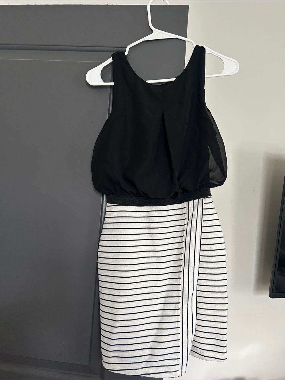 Black Sleeveless Top with Striped White Skirt Dress